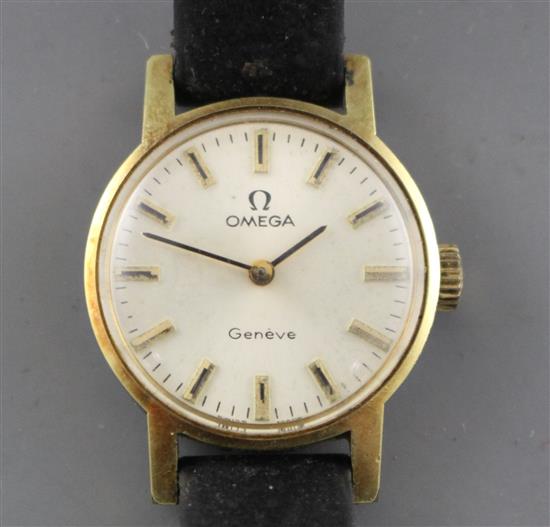 A ladys steel and gold plated Omega manual wind wrist watch, on associated leather strap.